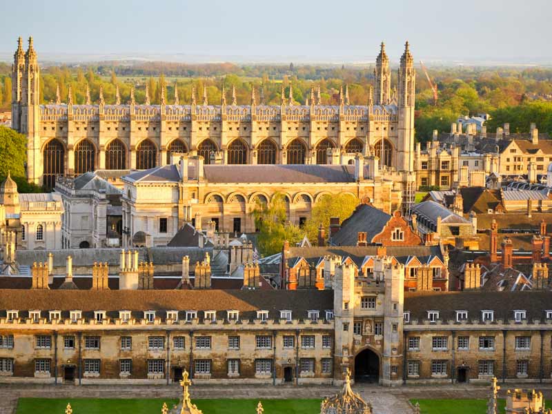 Photo from high up looking across the rooftops of Cambridge old town.