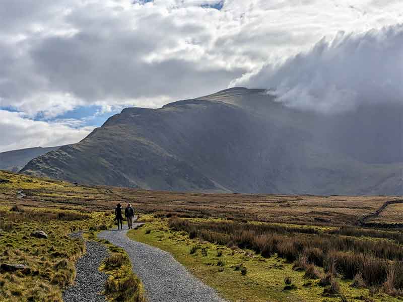 Two people hiking in Snowdonia National Park